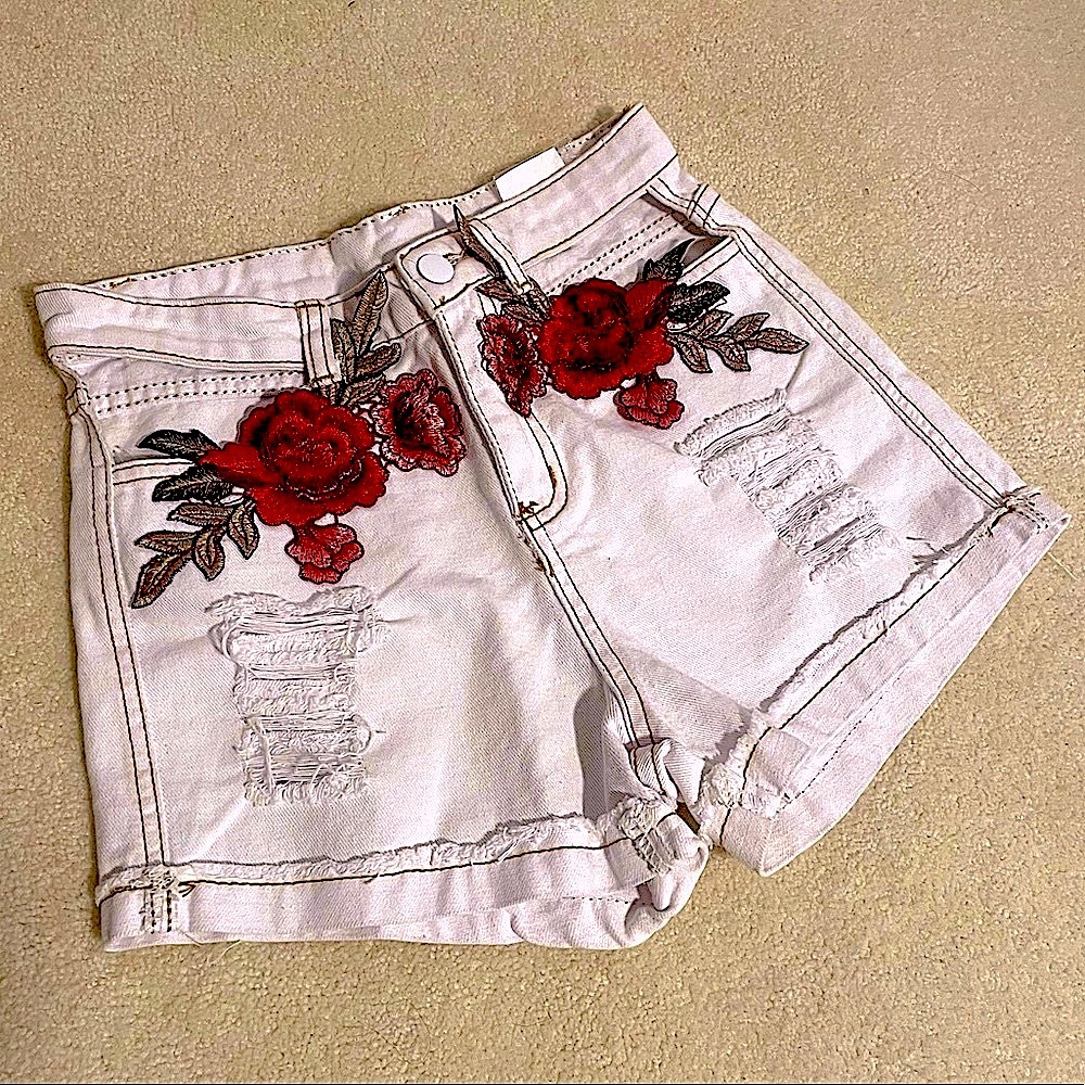 00 high waist slashed white jean shorts flower cut out hip frayed tan stitch